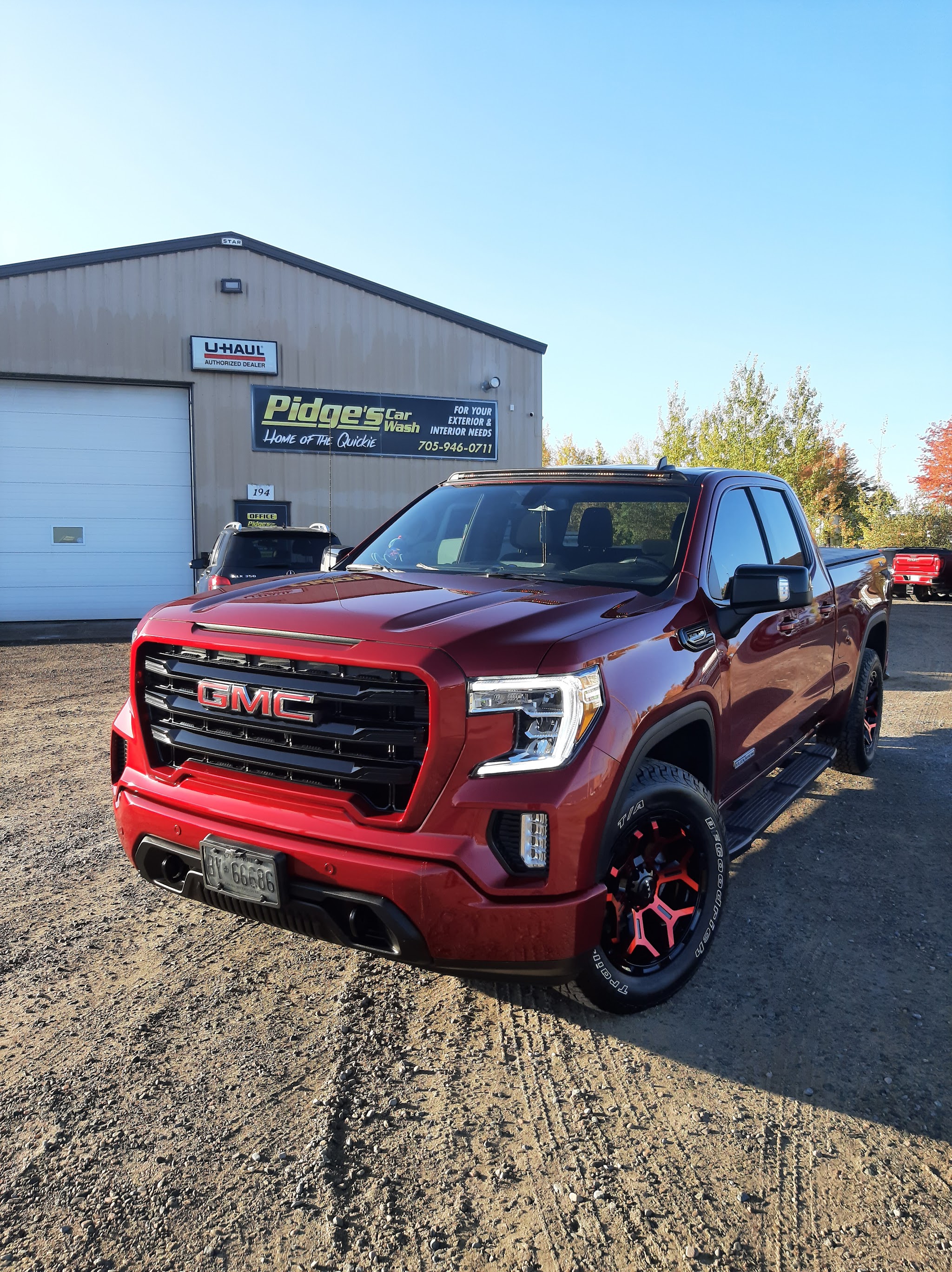 Red GMC truck after detailing